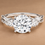 Round Cut Three Stone Engagement Ring with Twisted Band