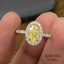 1.50CT Oval Yellow Lab Grown Diamond Engagement Ring: White Gold Halo Pave Setting