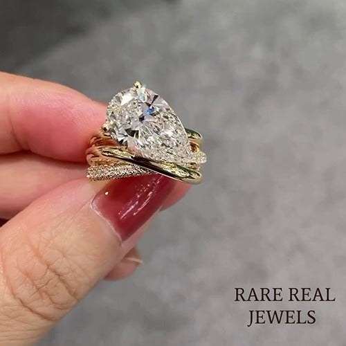 Pear Cut Lab Grown Diamond Ring: Twisted Band Yellow Gold Bridal Set