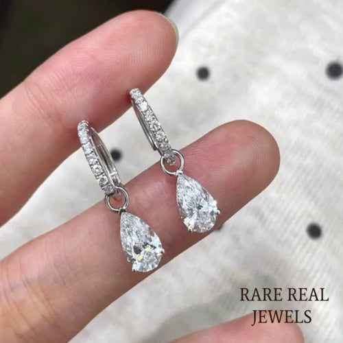 1.00ct Pear Moissanite Drop Earrings: 10K White Gold Dangle Huggies Main image