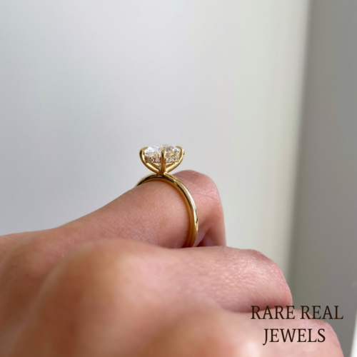 Oval Lab Grown Diamond Engagement Ring: Yellow Gold Solitaire with Hidden Halo