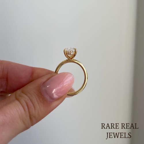 Oval Lab Grown Diamond Engagement Ring: Yellow Gold Solitaire with Hidden Halo