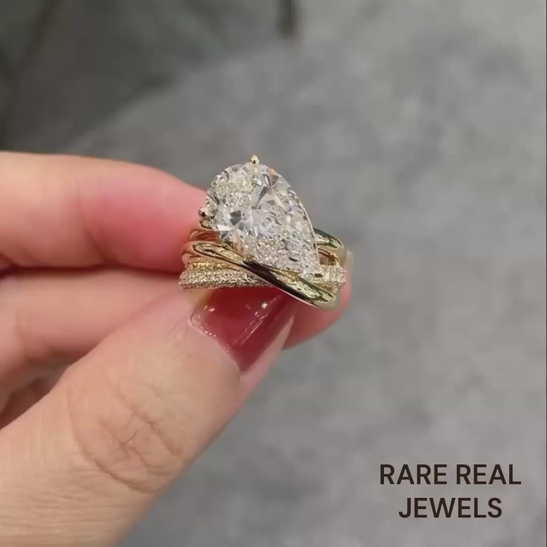 Pear Cut Lab Grown Diamond Ring: Twisted Band Yellow Gold Bridal Set