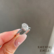 Oval Moissanite Engagement Ring: Bezel Set White Gold Cathedral Ring